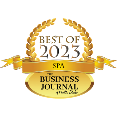 Gold award badge for 'Best of 2023 Spa' by The Business Journal of North Idaho on a white background